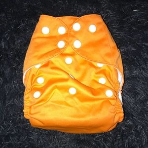 An orange cloth diaper.
